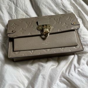 Louis Vuitton gold and beige LV logo vavin clutch w/gold chain detail, brand new